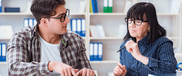 Two people engaged in discussion.
